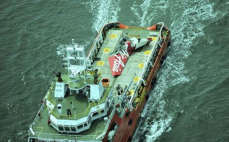 2015-01-15T025437Z_1007000001_LYNXMPEB0E023_RTROPTP_2_CNEWS-US-INDONESIA-AIRPLAN