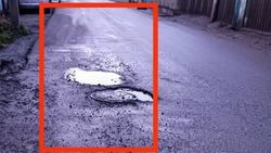 На ул.Ростовской на асфальте образовались ямы. Фото