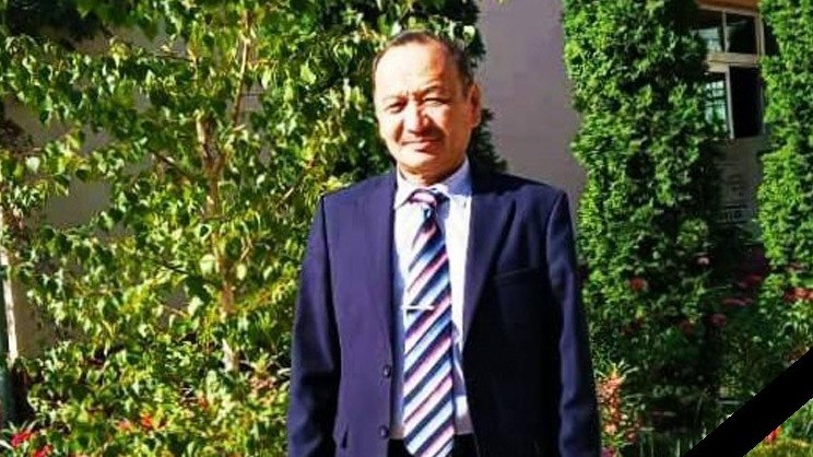 Малик Ракишев