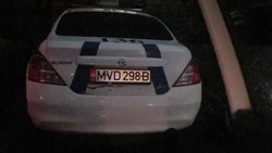 Машина МВД ночью припаркована во дворе дома по ул.Токтоналиева. Фото