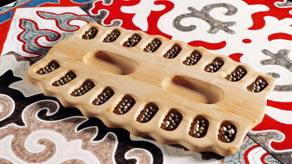 Тогуз коргоол