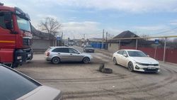 Грузовые авто разносят грязь по дороге на ул.Кустанайской. Ответ мэрии