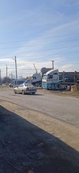 Парковка грузовых авто на Профсоюзной и Кайназаровой. Фото