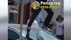 Мужчина прыгал на крыше и лобовом стекле автомашины