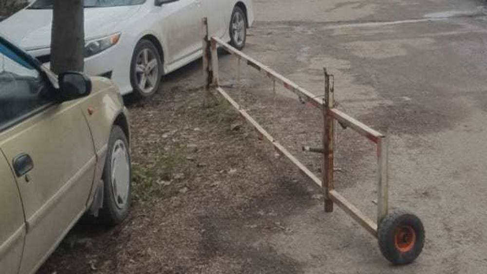 Шлагбаум на Джунусалиева внесен в план демонтажа, - мэрия