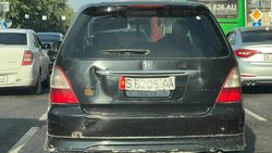 По городу ездит Honda Odyssey и плохо читаемыми номерами, - горожанин
