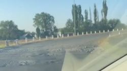 Состояние дороги на заезде на мост по объездной дороге. Видео