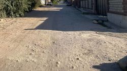 Планируется ли асфальтирование улицы Кулмурзаева в жилмассиве Кок-Жар?