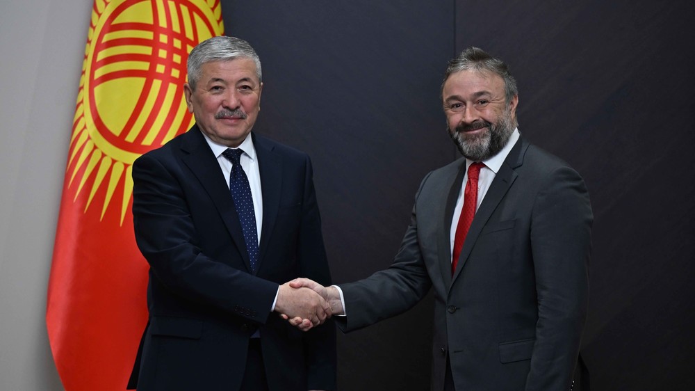 Адылбек Касымалиев, Наджи Бенхасин