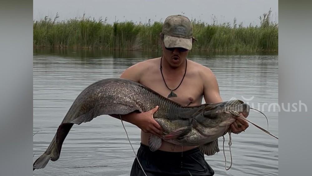 Артур Седов и сом весом 20 кг