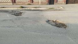 Мэрия ответила на жалобу о ямах на дороге по улице Учкун