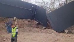 На ул.Коенкозова обрушился забор строящегося дома. Видео