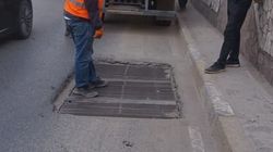 Люк на проспекте Манаса выравняли с уровнем дороги после обращения жителя