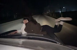 В Кара-Балте девушка лежа прокатилась на капоте для видео