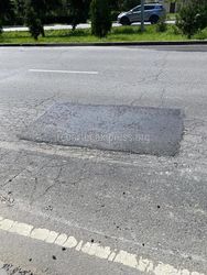 Яму на проезжей части на Жайыл Баатыра заделали