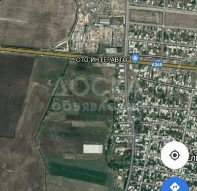 Продаю участок под строительство, 50 соток по трассе: объездной дороге..