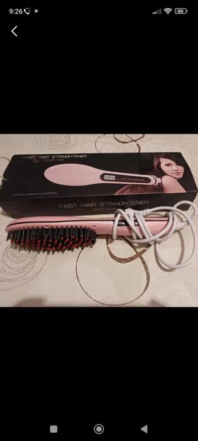 Продаю утюжок расческа