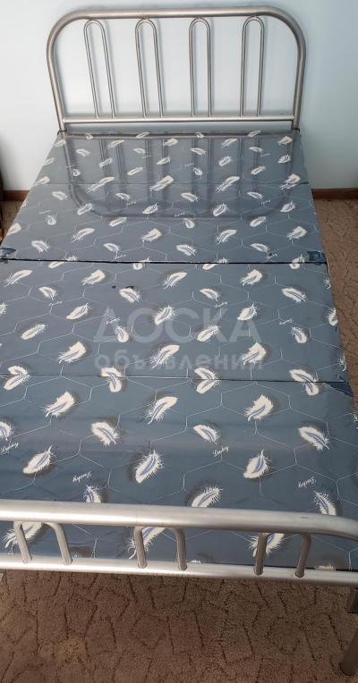 Складная металлическая кровать