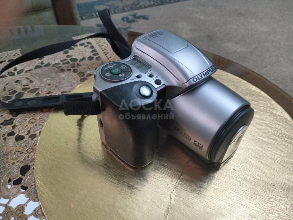 Продам  пленочный фотоаппарат OLIMPUS в  отличном  состоянии,