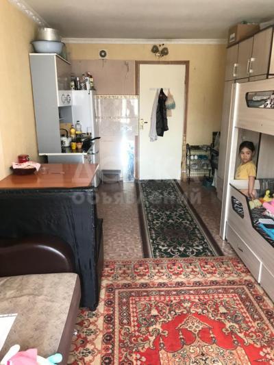 Продаю гостинку 18 м корид.типа 5/5этаж неугл.  Панфилова/Малдыбаева.