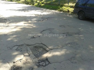 Когда будет произведен ремонт дороги в 7 микрорайоне? - читатель (фото)