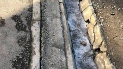В 12 мкр бордюры, арычные лотки и асфальтовое покрытие будут исправлены за счёт подрядчика, - мэрия