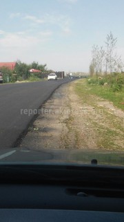 Почему в селе Кой-Таш новый асфальт уложили на метр уже старого? - читатель (фото)