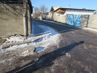 Автодорога в переулке Скандинавский покрыта льдом, - читатель <i>(фото)</i>