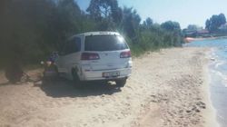 На Иссык-Куле «Ниссан» заехал на пляж и застрял. Видео