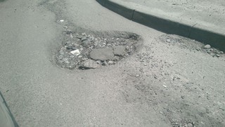 Читатель интересуется, когда отремонтируют участок ул.Кольбаева (фото)