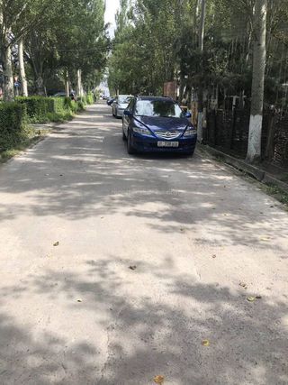 Парковка на тротуаре на ул.Токомбаева