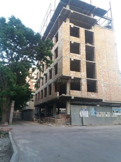 Законно ли возвели многоэтажное здание на ул.Исанова рядом со станцией скорой помощи? - читатель (фото)