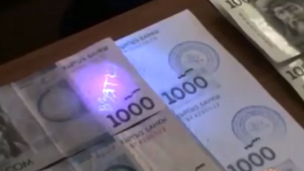 Бишкекте студенттен пара алууга шектелип кармалган профессор кызматтан четтетилди